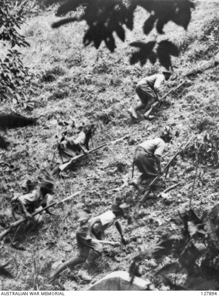 Japanese troops advancing Gemas.